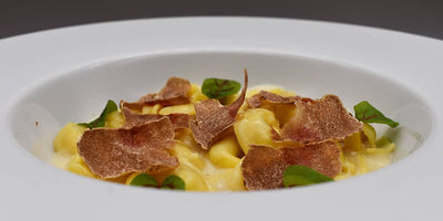 RECIPES - Meat tortellini with Parmesan cream and white truffle.