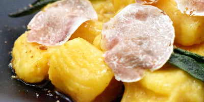 RECIPES - Pumpkin gnocchi in butter and sage, crushed amaretto biscuit and white truffle.