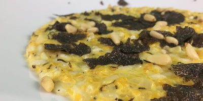 RECIPES - Risotto with pumpkin and mascarpone cheese, pine nuts and black truffle "Pregiato"